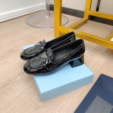Prada Soft cow patent leather Mid-heel loafers in black P82