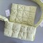 Bottega Veneta Medium padded Tech Cassette intreccio nylon cross-body bag Yellow 2023